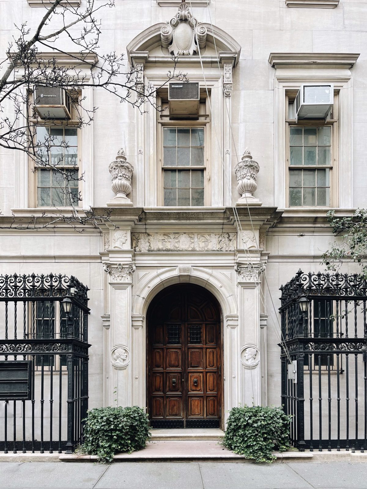 Stone-fronted New York City building entrance, Upper East Side